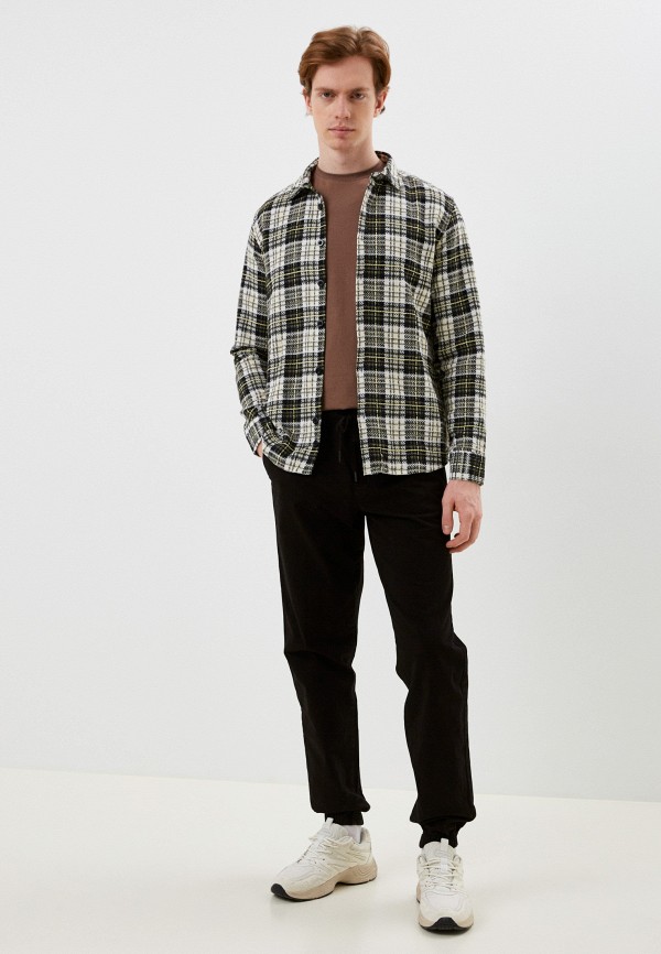 фото Брюки the cave