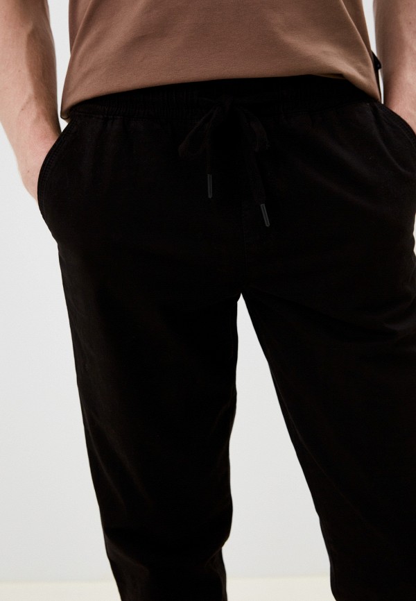 фото Брюки the cave