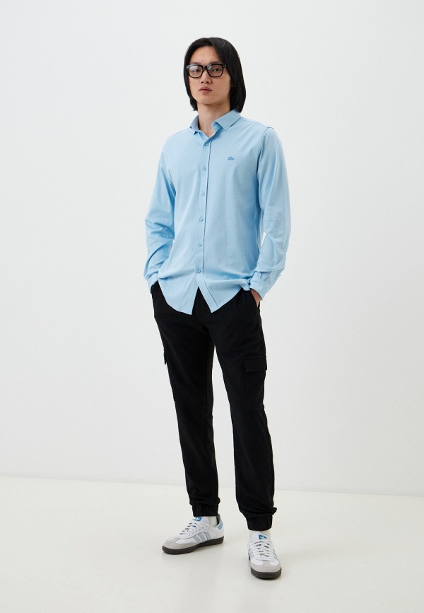 фото Брюки lacoste