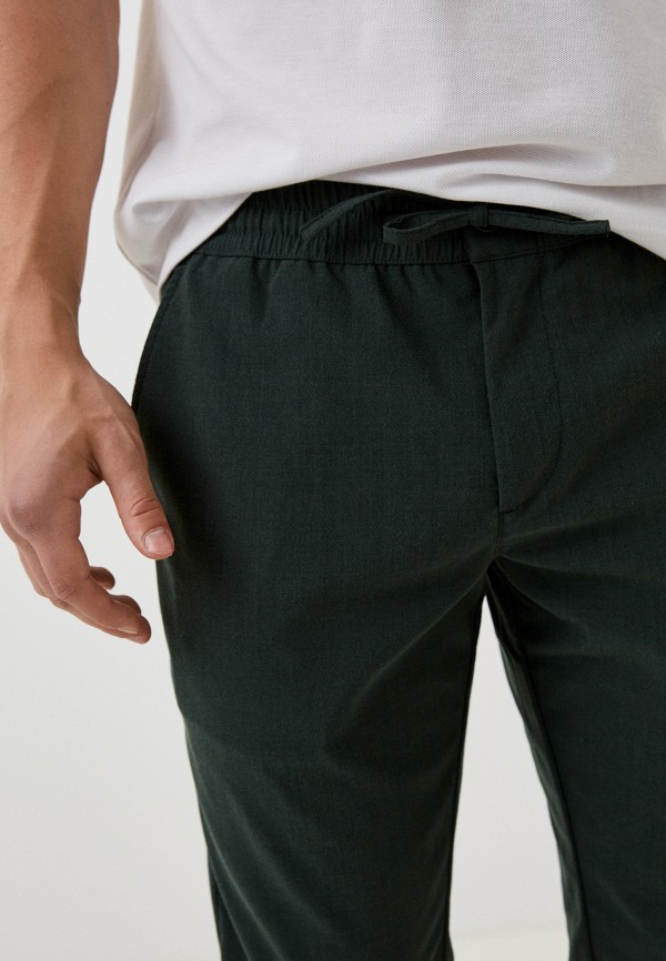 фото Брюки lacoste