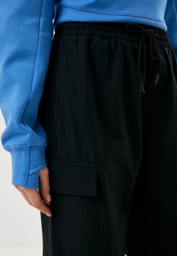 фото Брюки lacoste
