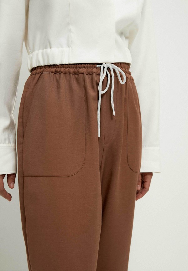 фото Брюки zarina