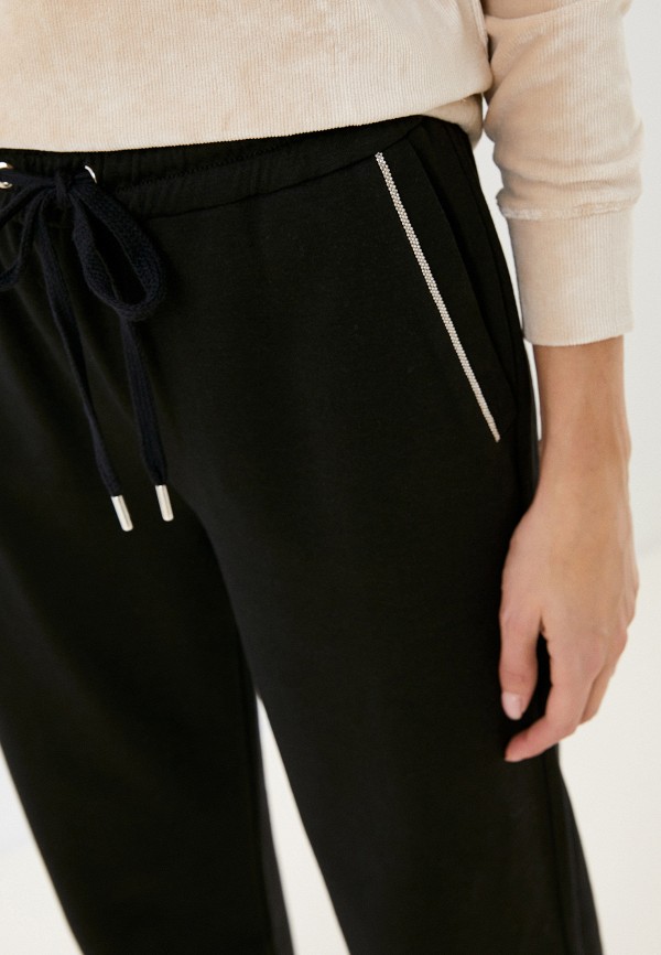 фото Брюки спортивные lusio