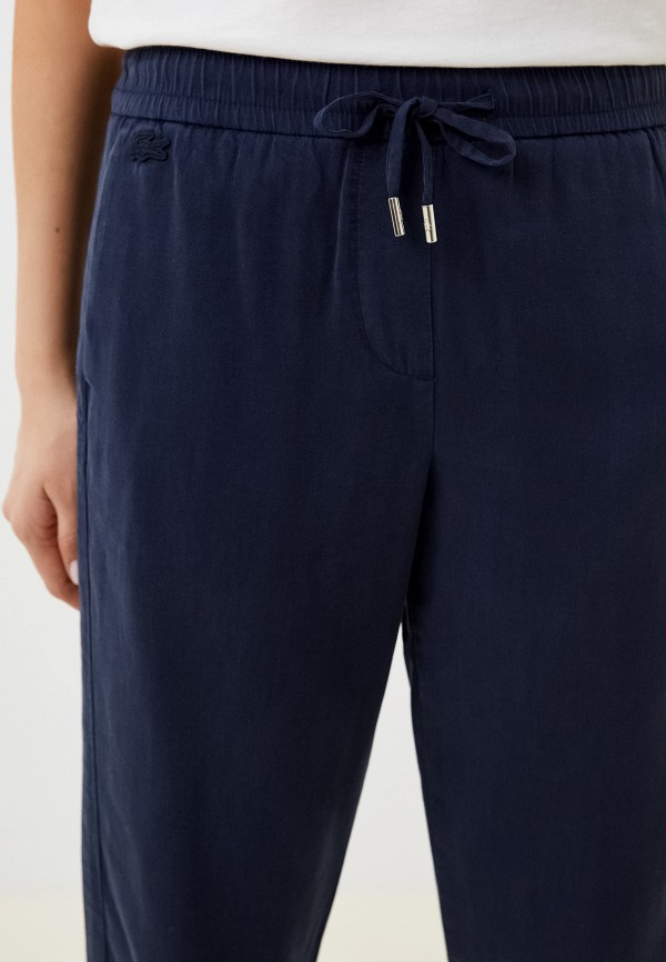 фото Брюки lacoste