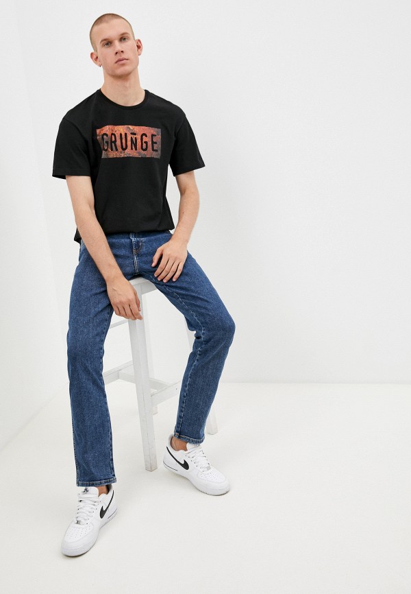 фото Джинсы wrangler