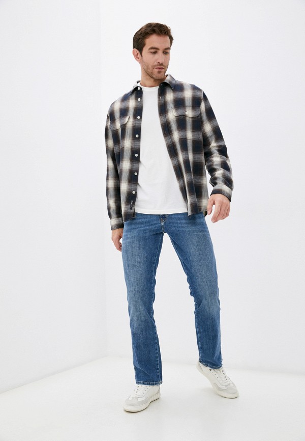 фото Джинсы wrangler