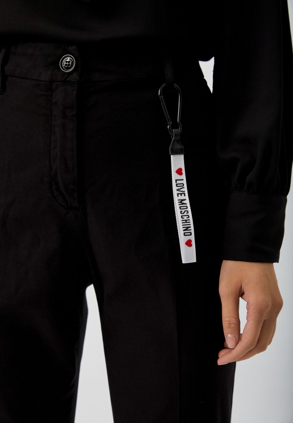 фото Брюки и брелок love moschino