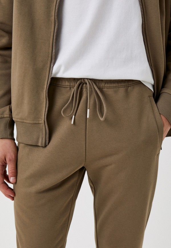 фото Костюм спортивный denote