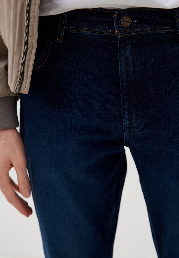 фото Джинсы wrangler