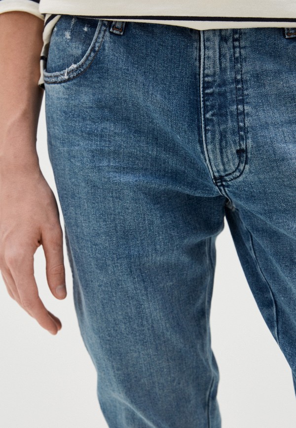 фото Джинсы wrangler