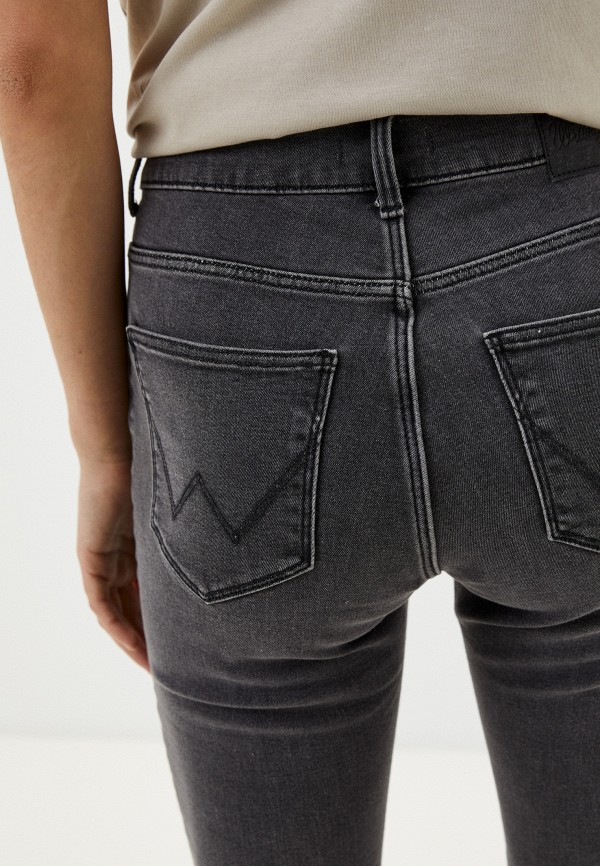 фото Джинсы wrangler