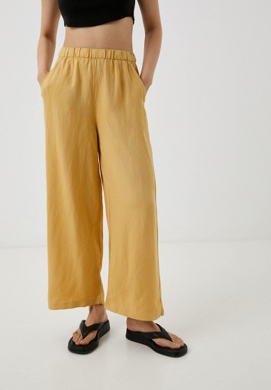 Желтые женские широкие брюки (клеш) больших размеров — купить винтернет-магазине Ламода