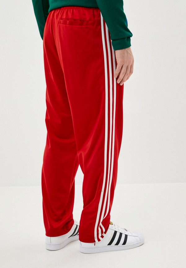 Красные штаны адидас. Штаны adidas Originals красные. Adidas Originals брюки спортивные fbird TP. Штаны адидас Essentials 3 оригинал красный. Трико adidas красные.