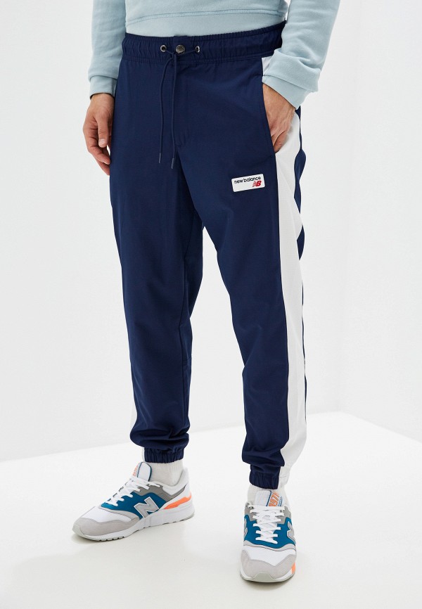 Брюки спортивные New Balance NB ATHLETICS WINDBREAKER PANT, цвет: синий,  NE007EMFNIO2 — купить в интернет-магазине Lamoda