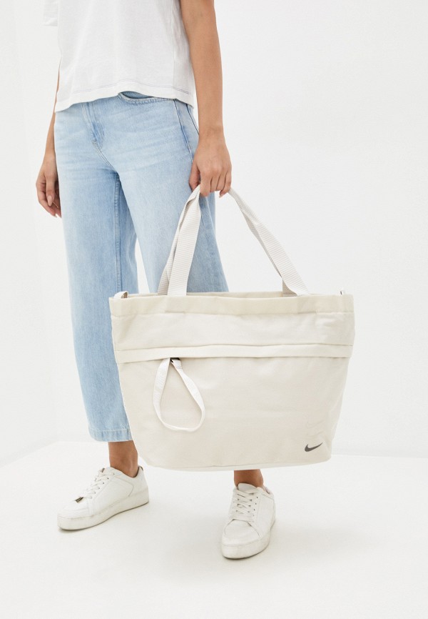 Сумка спортивная Nike NK SPRTSWR ESSENTIALS TOTE, цвет: бежевый ...