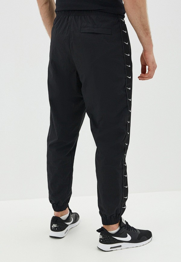 Nike Брюки спортивные - SPORTSWEAR SWOOSH MEN'S WOVEN PANTS - фото 3
