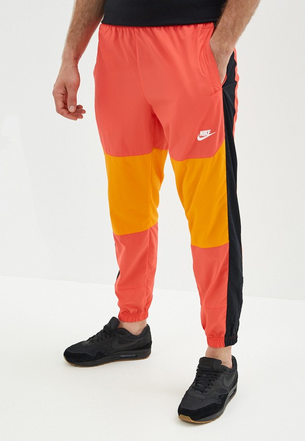 Nike track pants orange hotsell