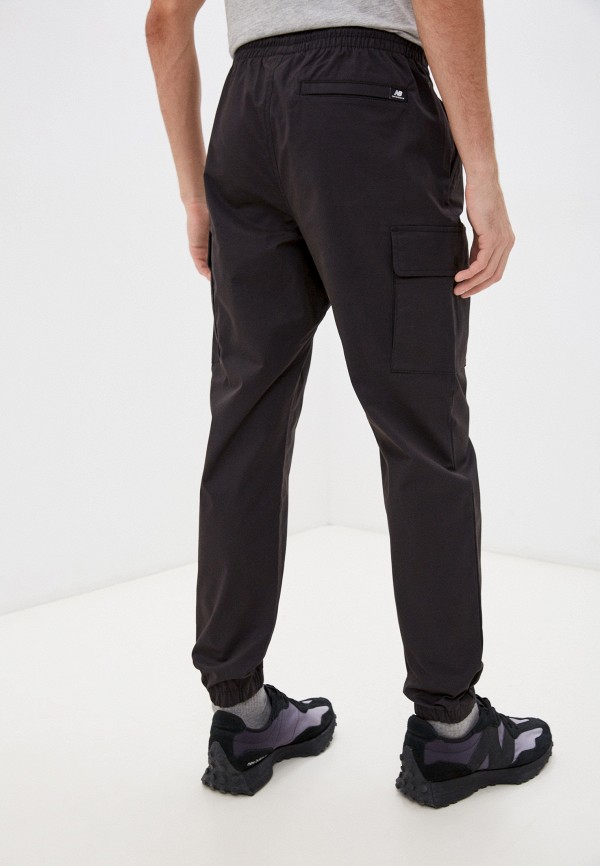 Брюки New Balance NB Athletics Woven Cargo Pant, цвет черный