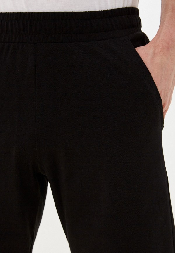 PUMA Шорты спортивные - ESS Jersey Shorts Puma Black - фото 4