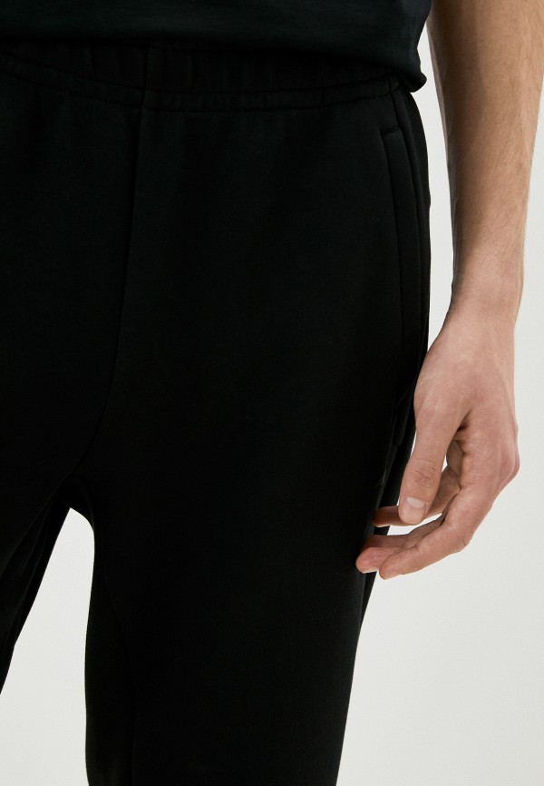 Anta Брюки спортивные - Cross-training - фото 4