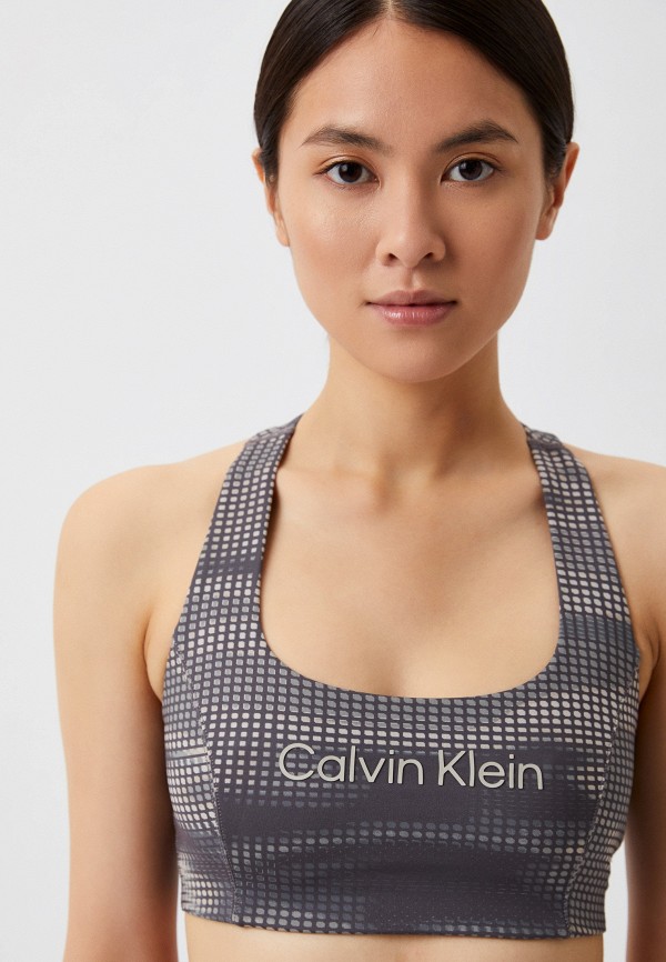 Calvin Klein Топ спортивный - Essentials  WO - Medium Support Sports Bra (Print) - фото 4