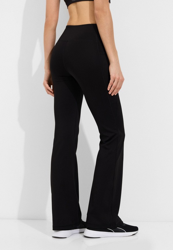 PUMA Брюки спортивные - W TAD ESSENTIAL HW BOOTCUT PANT - фото 3