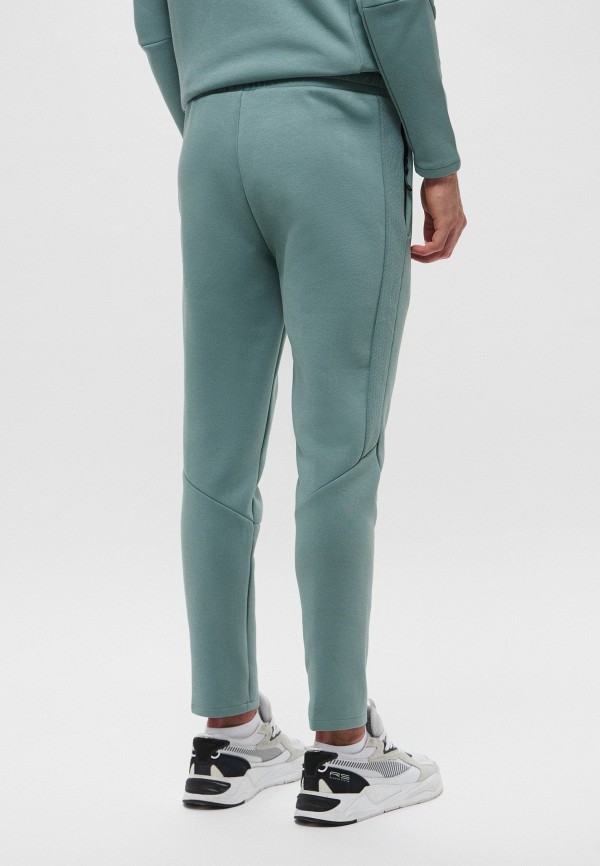 PUMA Брюки спортивные - EVOSTRIPE Pants DK op - фото 3