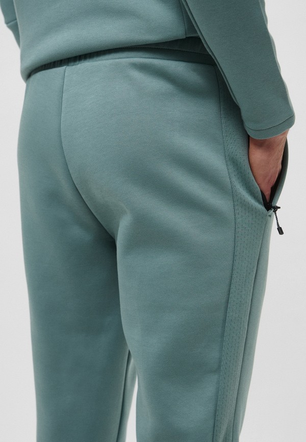 PUMA Брюки спортивные - EVOSTRIPE Pants DK op - фото 5