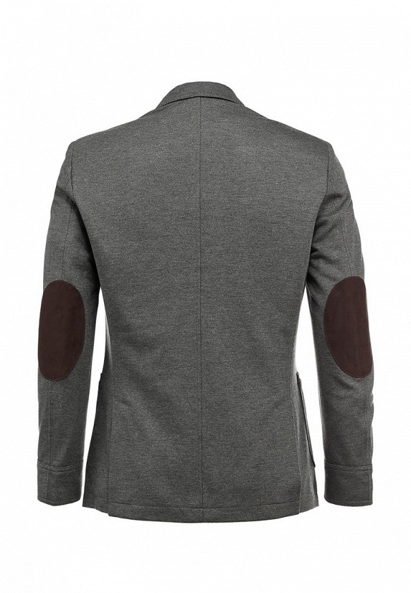 мужской твидовый пиджак с кожаными нашивками на локтях крупным планом