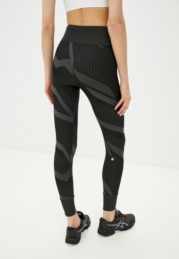 фото Тайтсы asics
