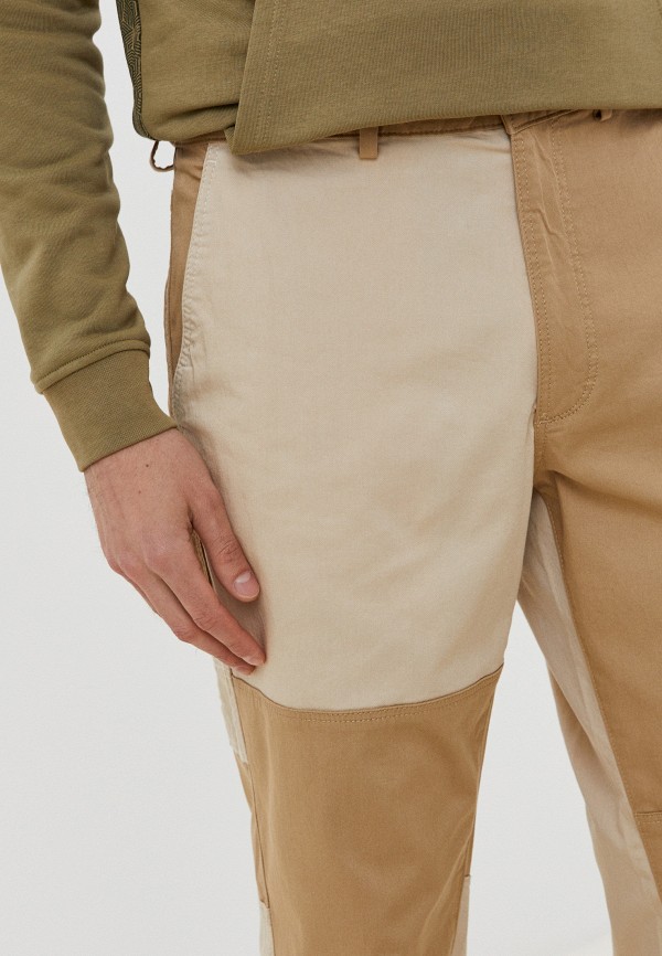 фото Брюки lacoste