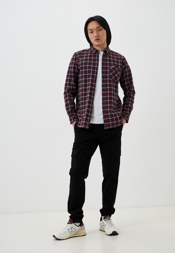 фото Брюки lacoste