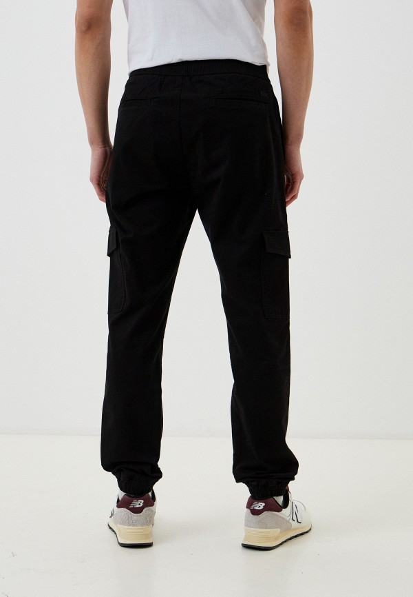 фото Брюки lacoste