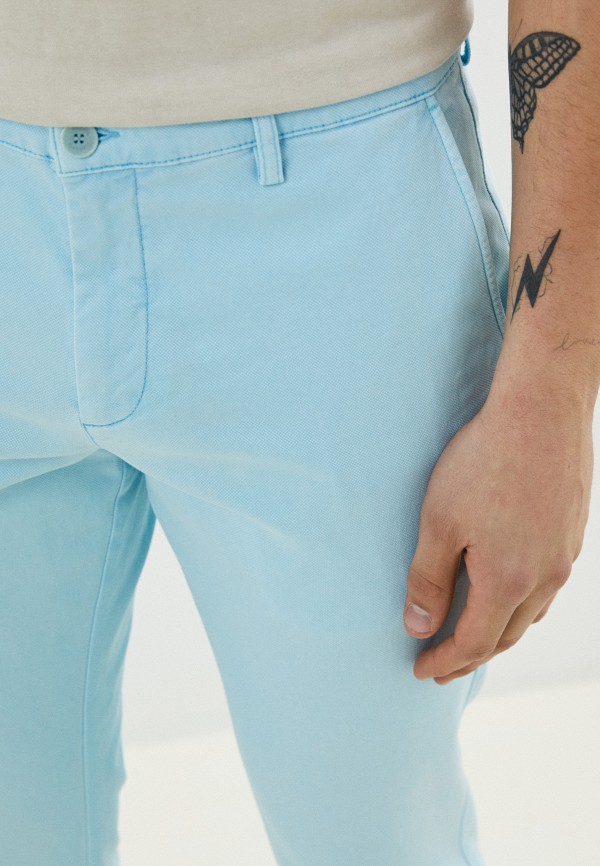 фото Брюки lacoste