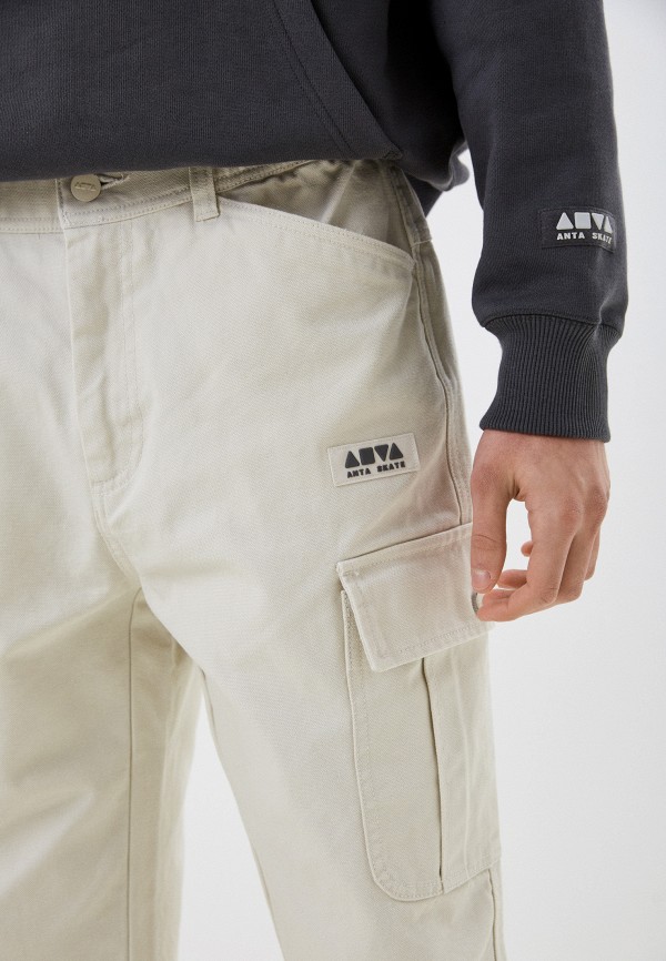 фото Брюки anta