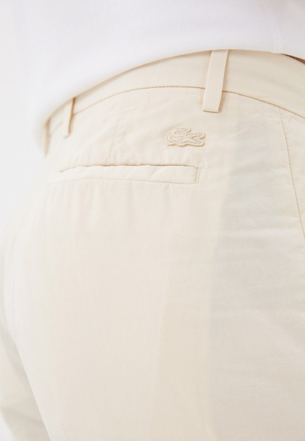 фото Брюки lacoste