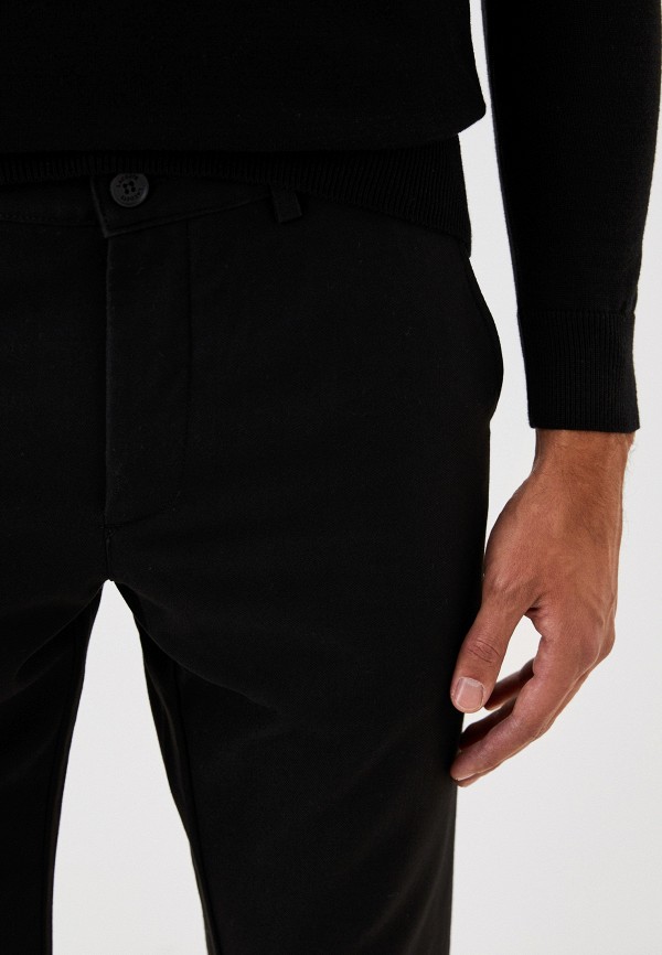 фото Брюки lacoste