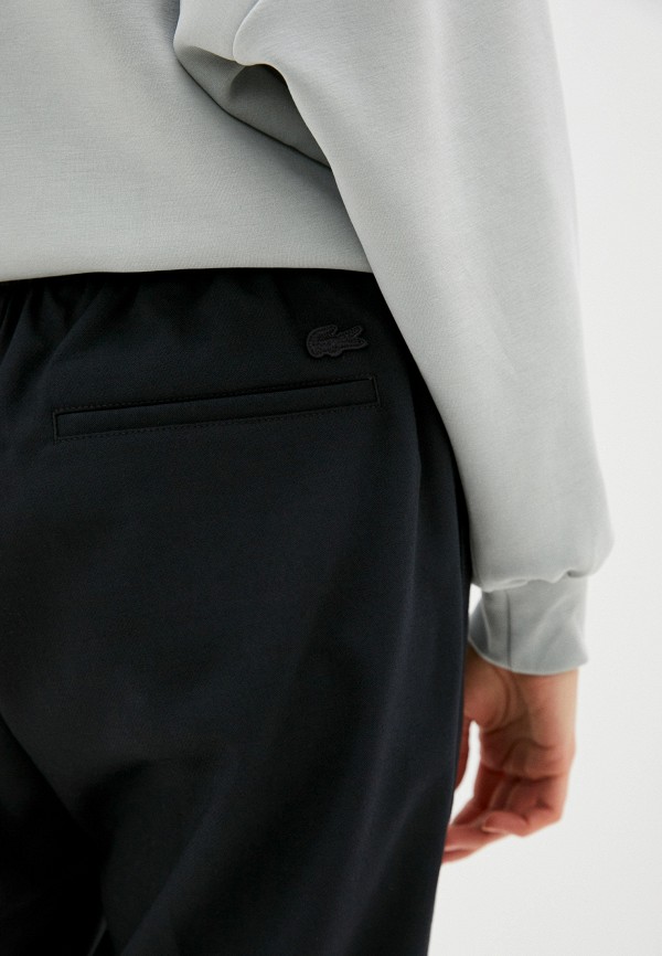 фото Брюки lacoste