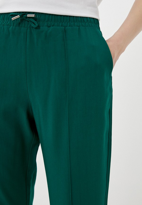 фото Брюки lacoste