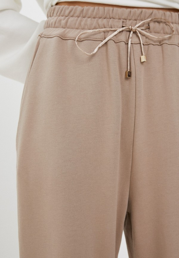 фото Брюки спортивные lusio