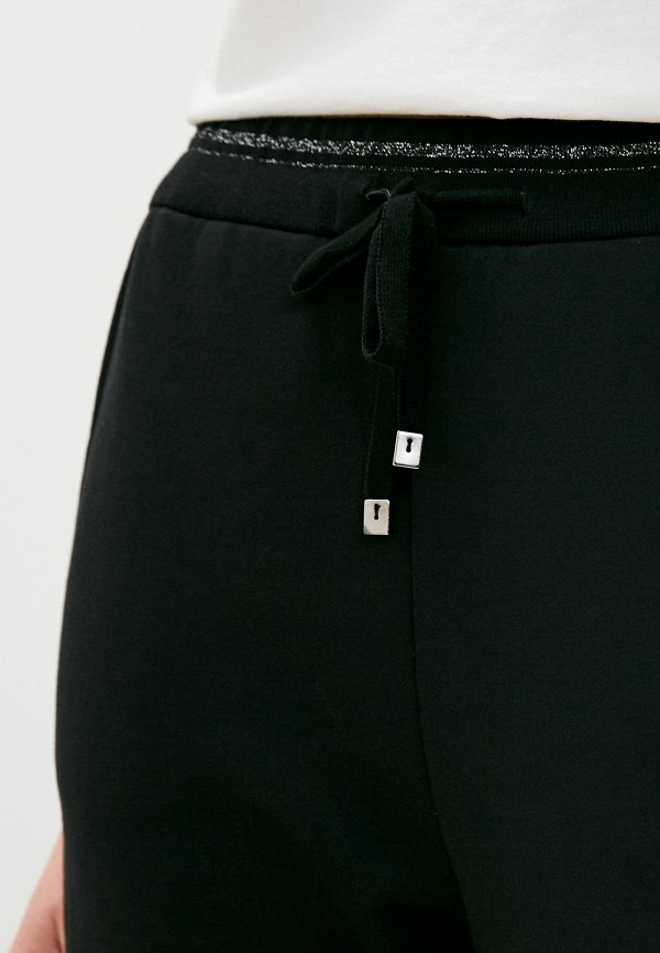 фото Брюки спортивные lusio