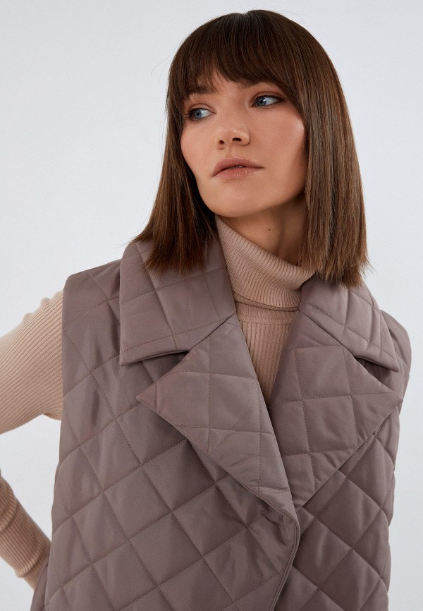 фото Жилет утепленный zarina