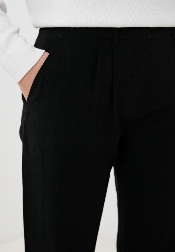 фото Брюки lacoste