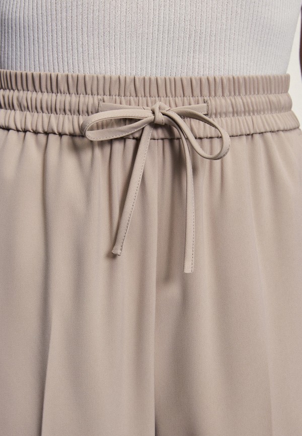 фото Брюки zarina