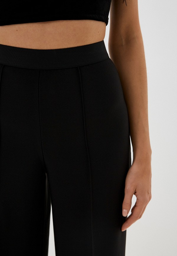 фото Брюки dynko