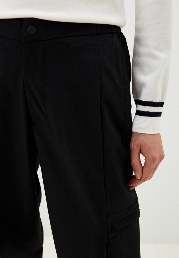 фото Брюки lacoste