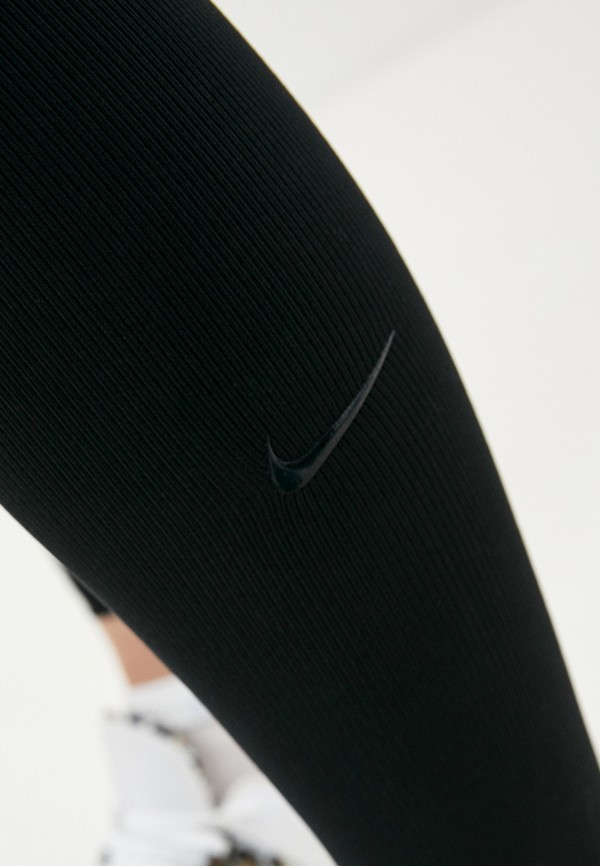 фото Тайтсы nike