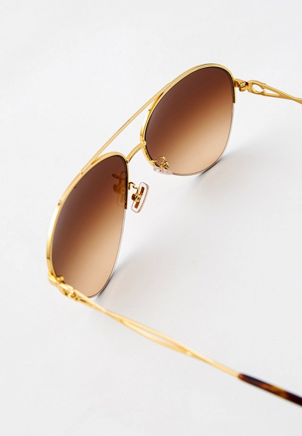 фото Очки солнцезащитные coach