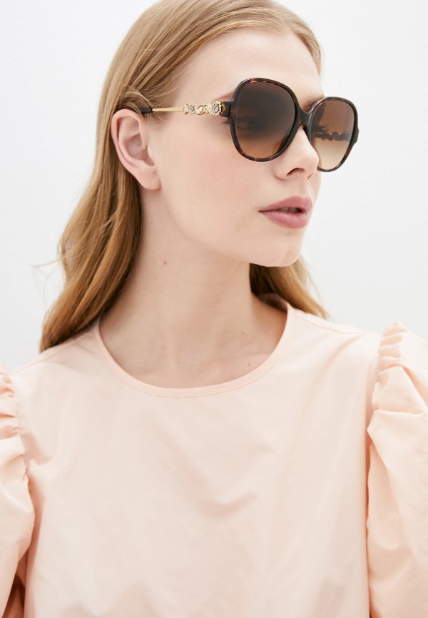 фото Очки солнцезащитные coach