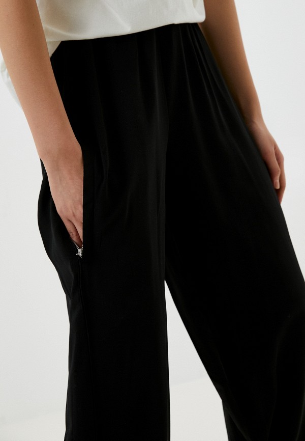 фото Брюки religion